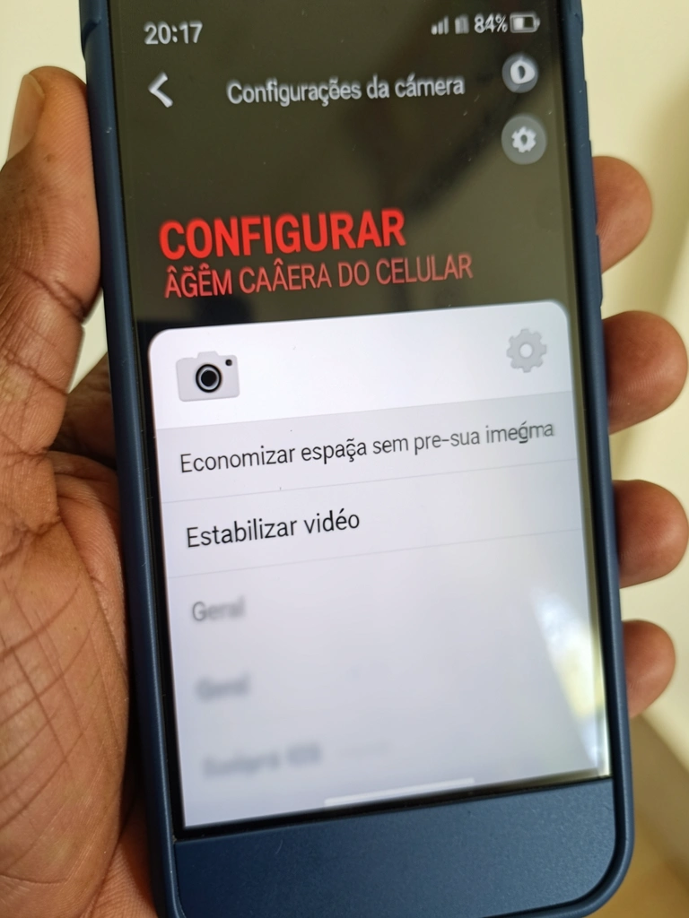 Ícone de engrenagem representando configurações de câmera em um aplicativo de celular.